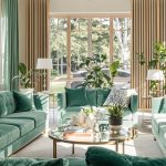 Modern living room with sleek furniture and vibrant decor.